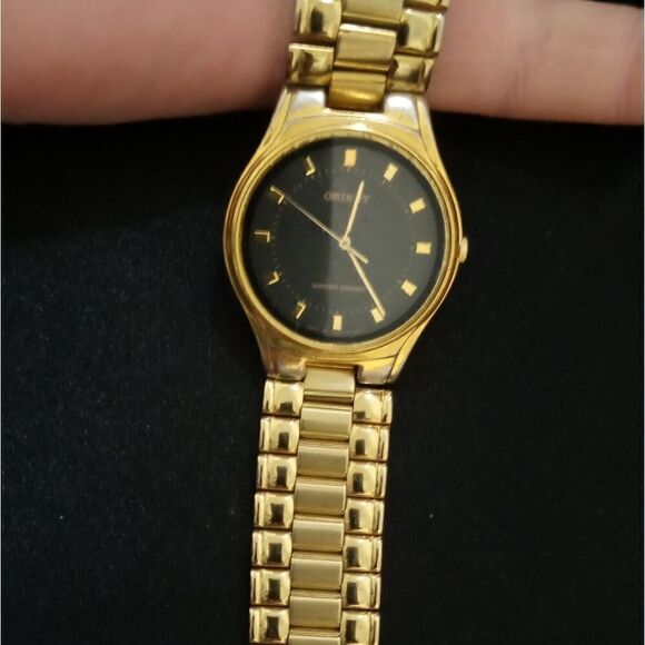 Golden Orient watch with a dark blue face - Picture 11 of 11